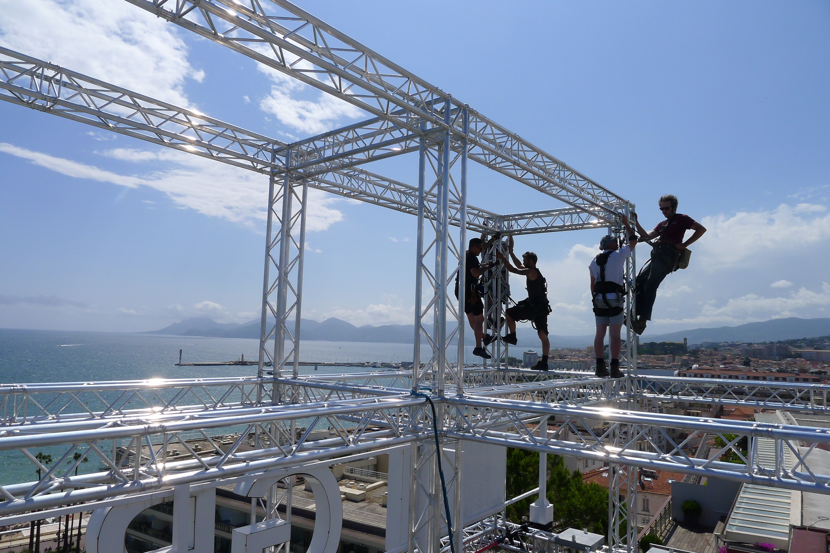 Installing truss grid on Grand Hotel Roof , Cannes